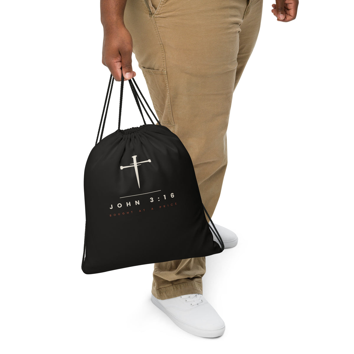 Black drawstring gym bag with a cream three-nail cross and JOHN 3:16