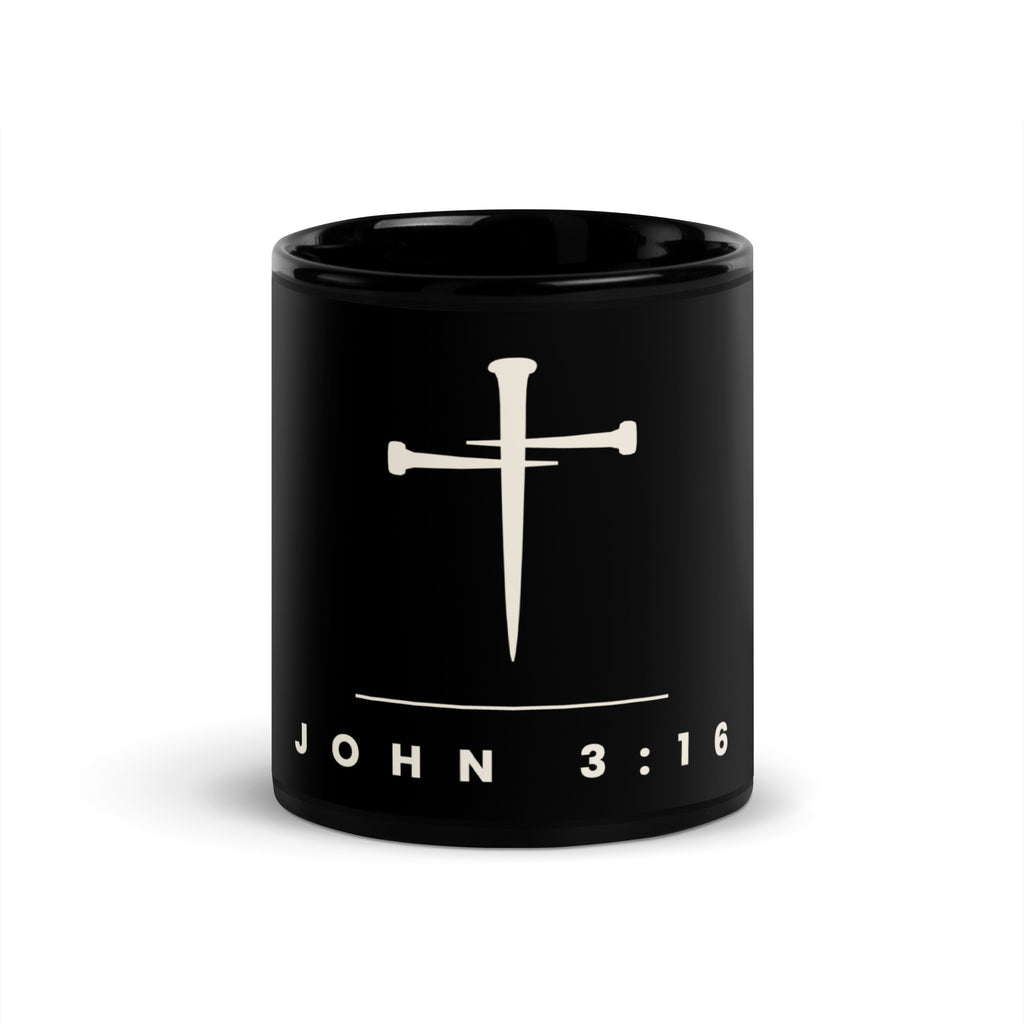 John 3:16 black mug on a desk with keyboard and plant