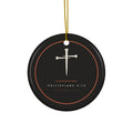 Black ceramic ornament with cream nail cross and Philippians 4:13 inside a copper ring, hanging from a gold string