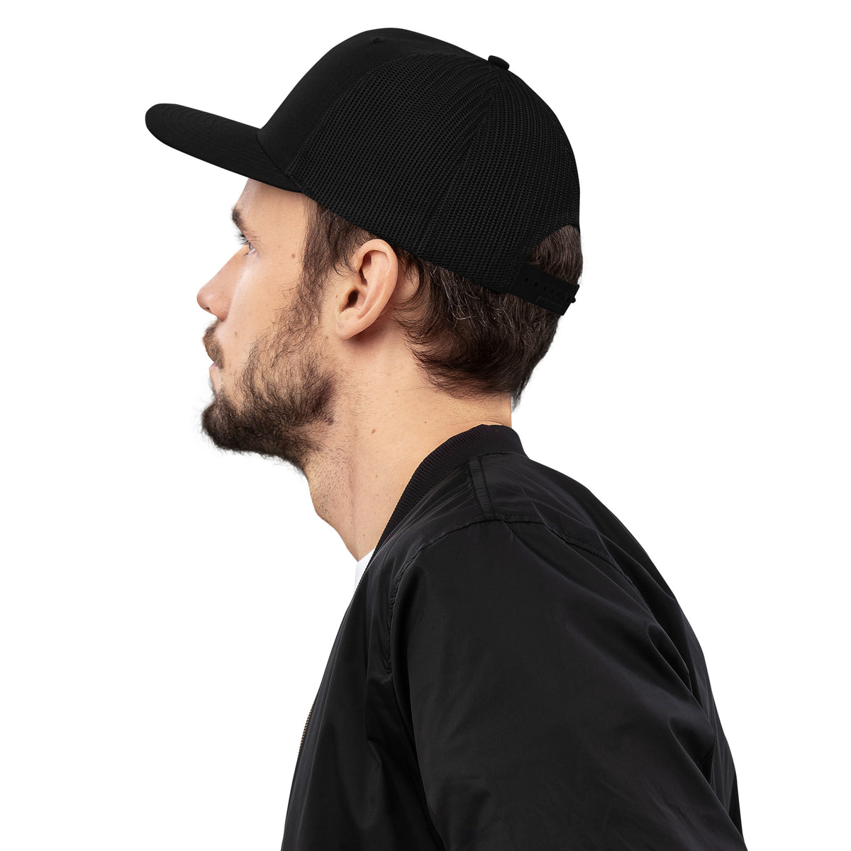 Angled view of the embroidered cross snapback cap