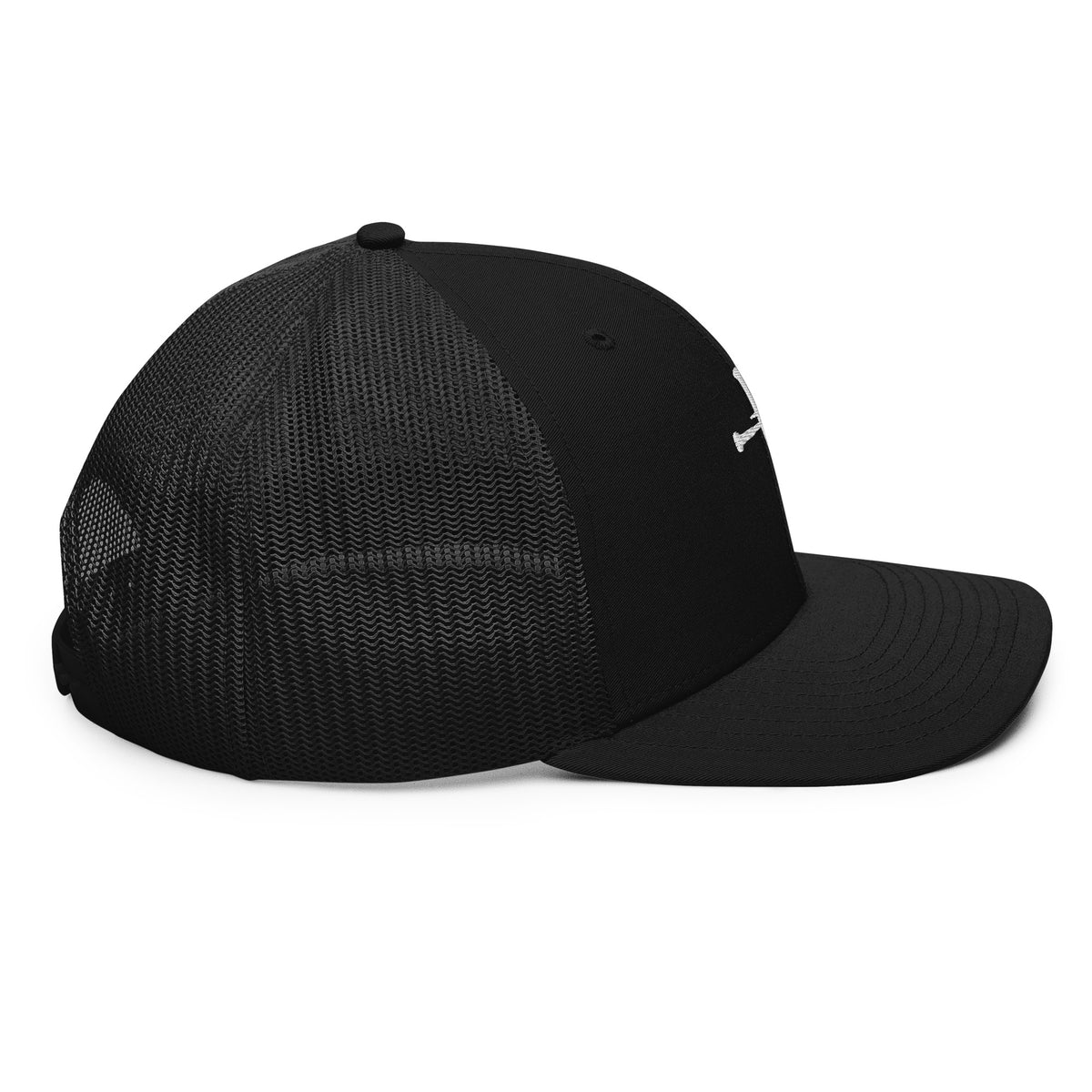 Woman wearing the embroidered cross trucker cap