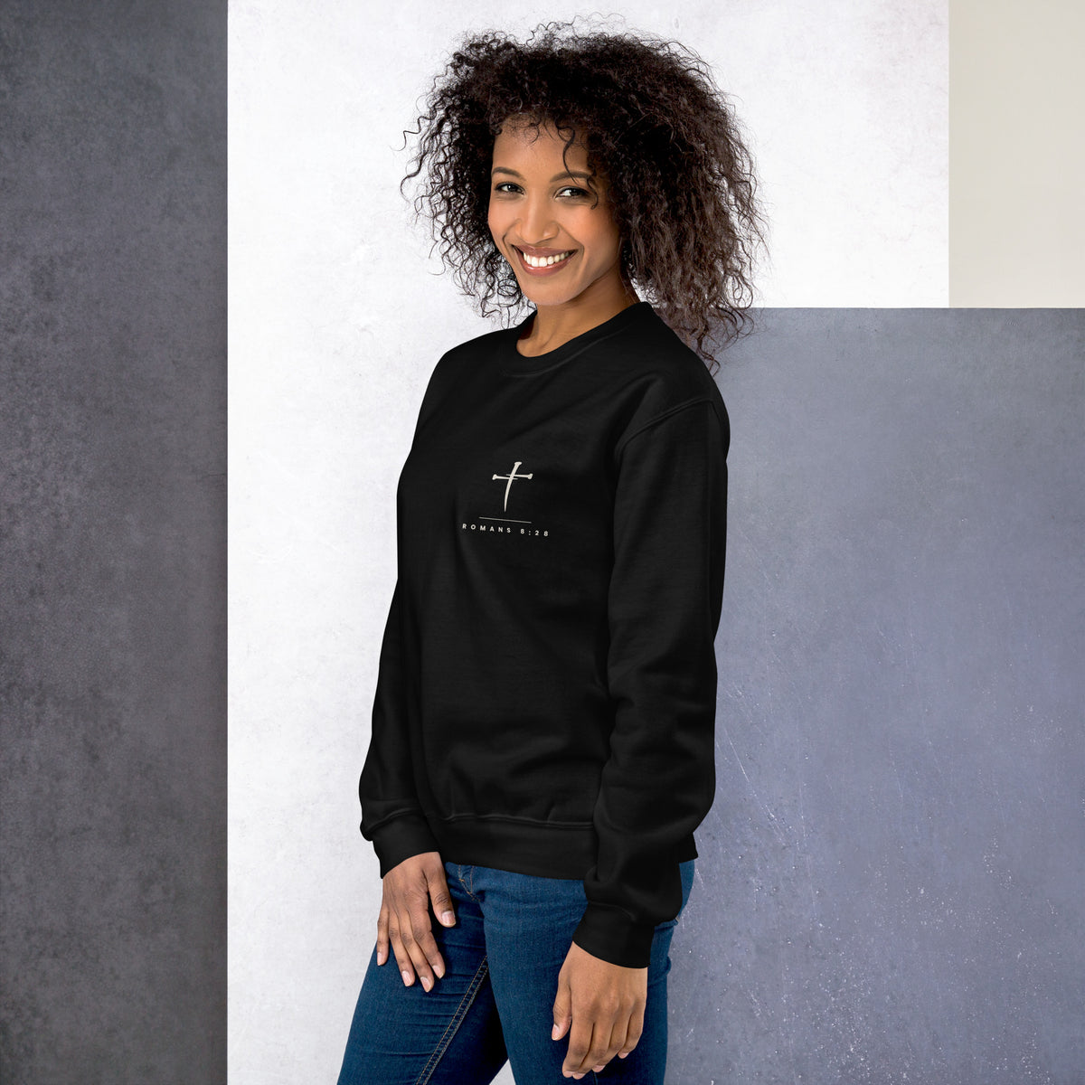 Romans 8:28 Crewneck Sweatshirt worn - black, left side