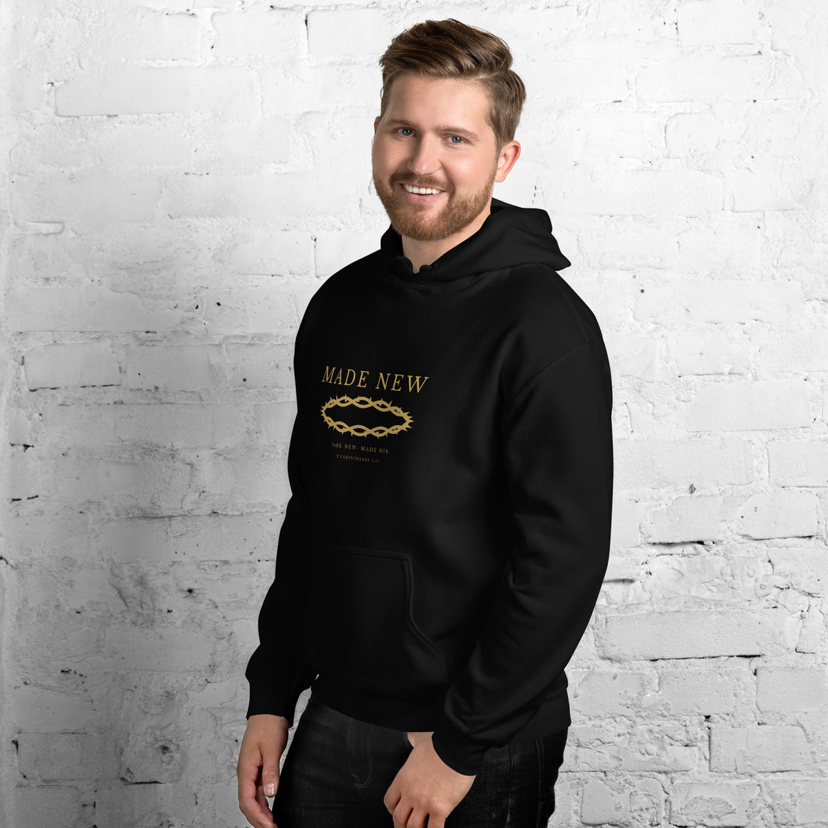 Man wearing the Made New black hoodie, three-quarter view