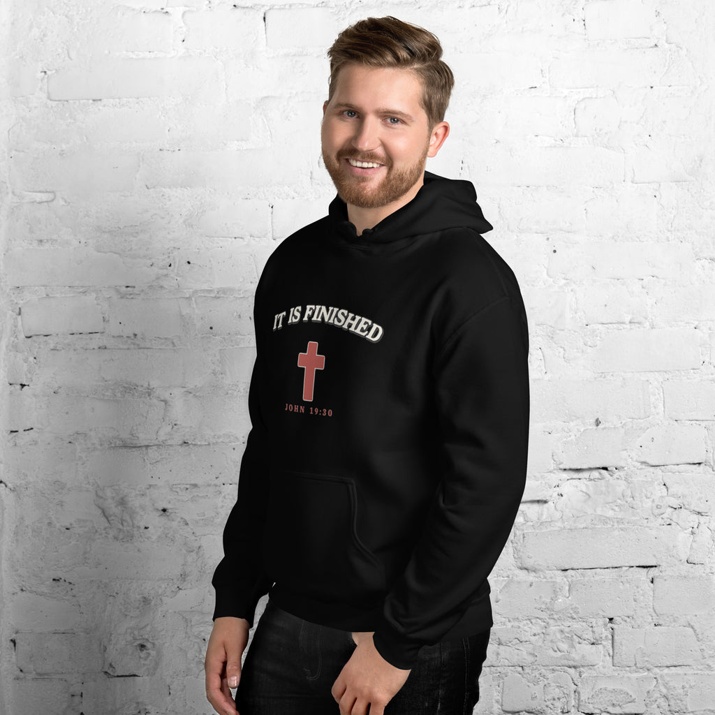 Man wearing the It Is Finished black hoodie, three-quarter view