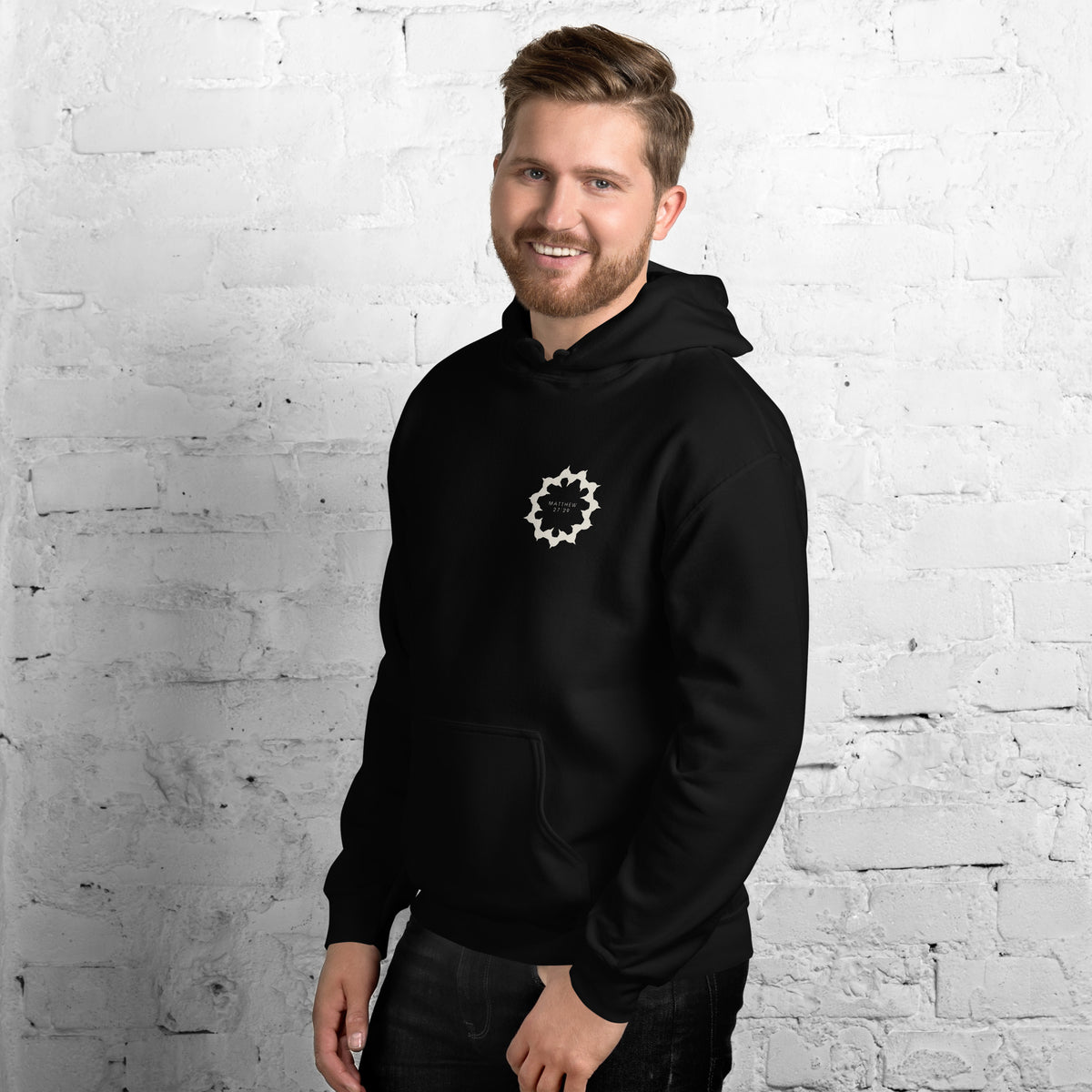 Man wearing the They Meant It As Mockery black hoodie, three-quarter view