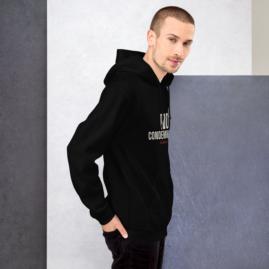 Man wearing the No Condemnation Romans 8:1 black hoodie, back three-quarter view