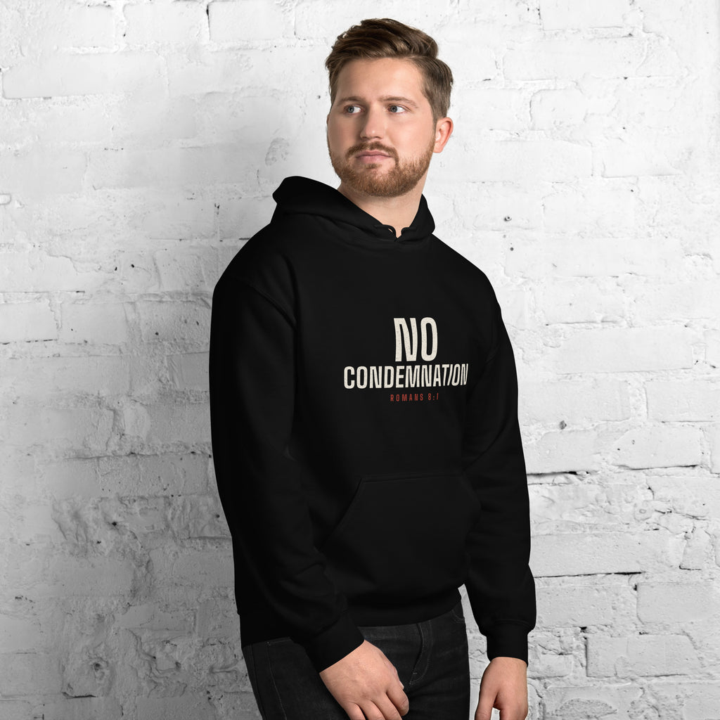 Man wearing the No Condemnation Romans 8:1 black hoodie with cream chest print, front view