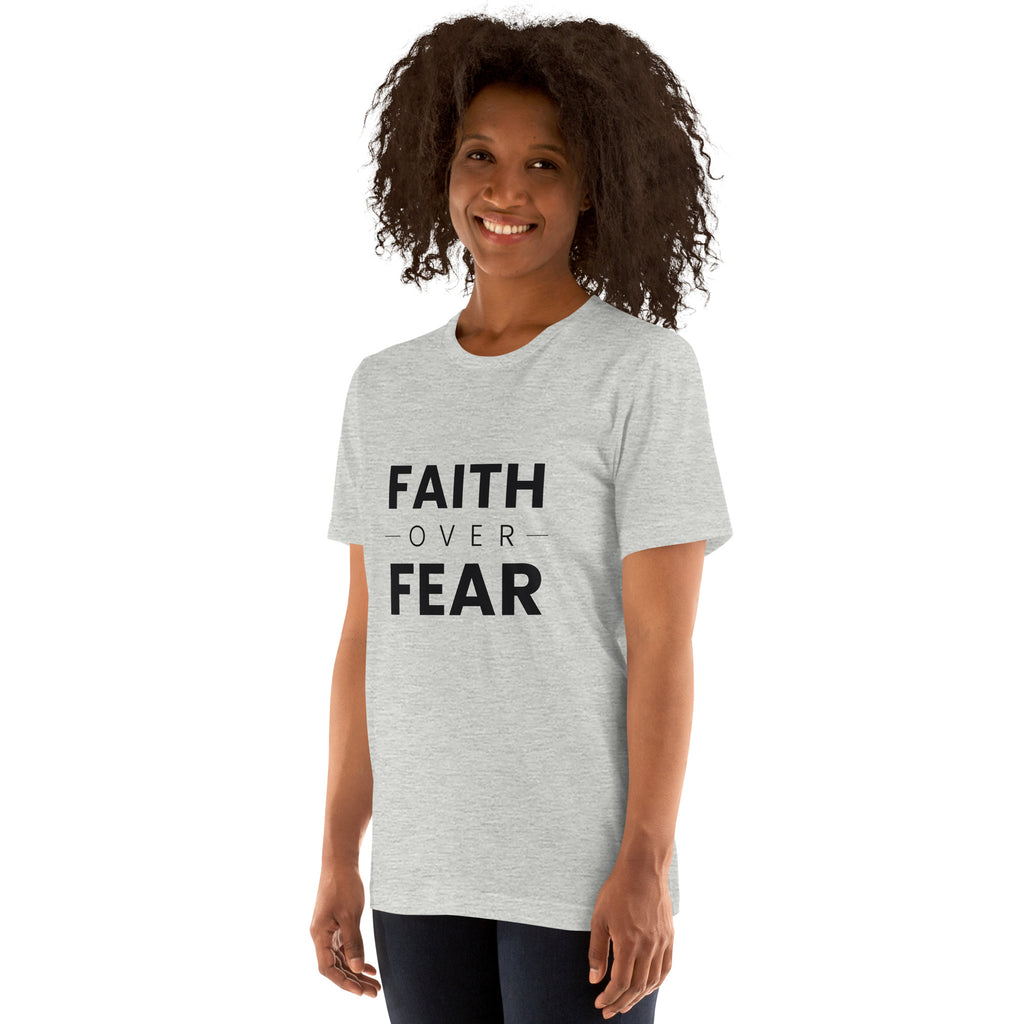 Faith Over Fear T-Shirt — woman wearing the athletic heather tee, front view