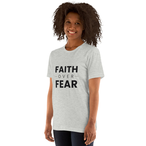 Faith Over Fear T-Shirt — woman wearing the athletic heather tee, front view