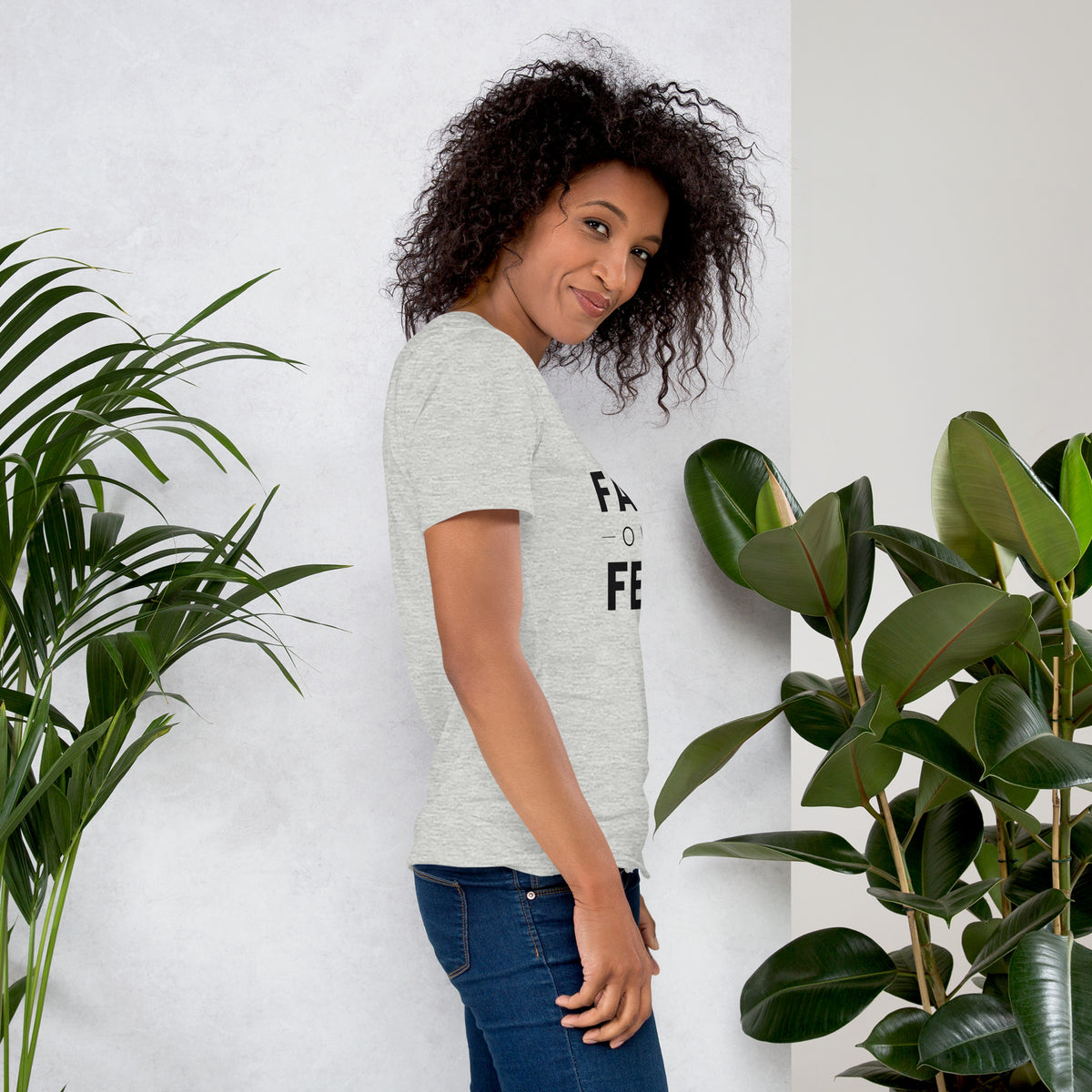 Faith Over Fear T-Shirt — lifestyle photo of the athletic heather tee