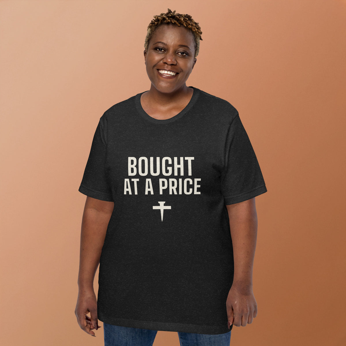 Woman wearing the Bought At A Price t-shirt in black heather with cream nail-cross print, front view