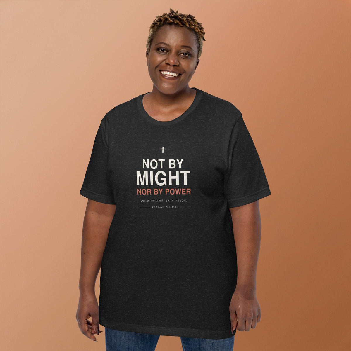 Not By Might T-Shirt — model wearing the black heather tee, front view showing the Zechariah 4:6 lettering