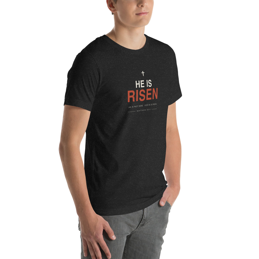He Is Risen T-Shirt — black heather tee, right three-quarter view on model