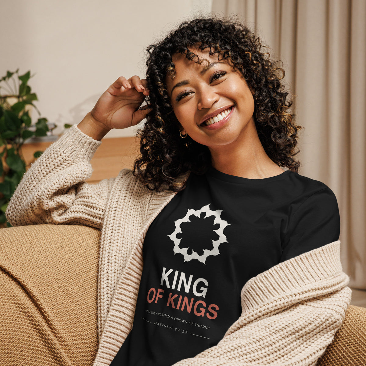 King Of Kings Women's Relaxed T-Shirt — full-length view of the black relaxed tee on model
