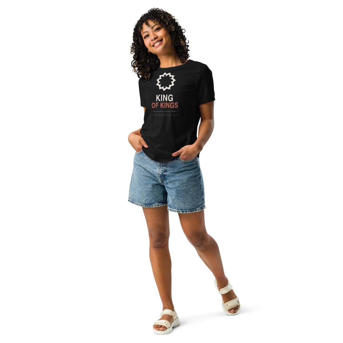 King Of Kings Women's Relaxed T-Shirt — model wearing the black relaxed tee, close front view of the design