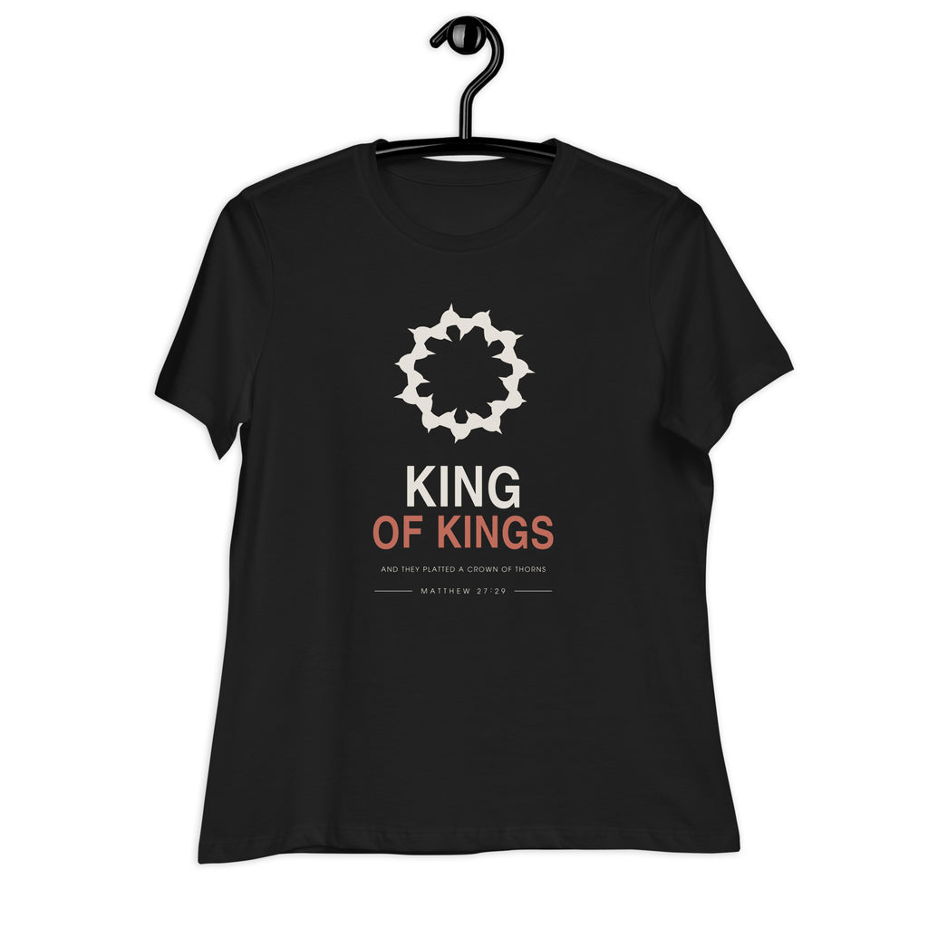 King Of Kings Women's Relaxed T-Shirt — black relaxed-fit tee shown on a hanger, front view