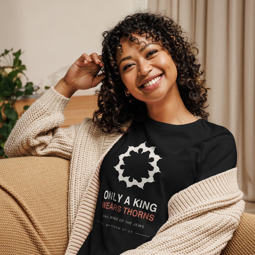 Only A King Wears Thorns Women's Relaxed T-Shirt — full-length view of the black relaxed tee on model