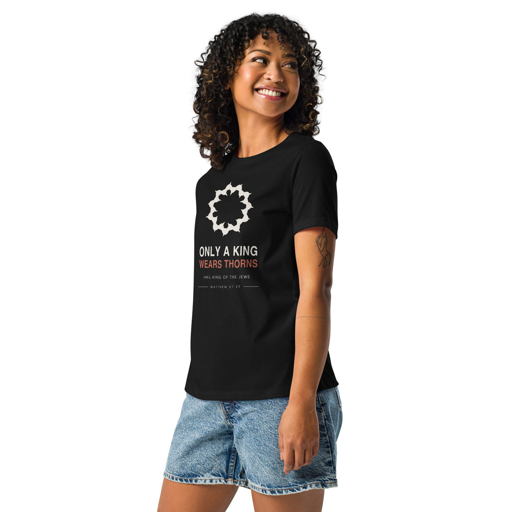 Only A King Wears Thorns Women's Relaxed T-Shirt — model in the black relaxed tee, three-quarter view showing the fit